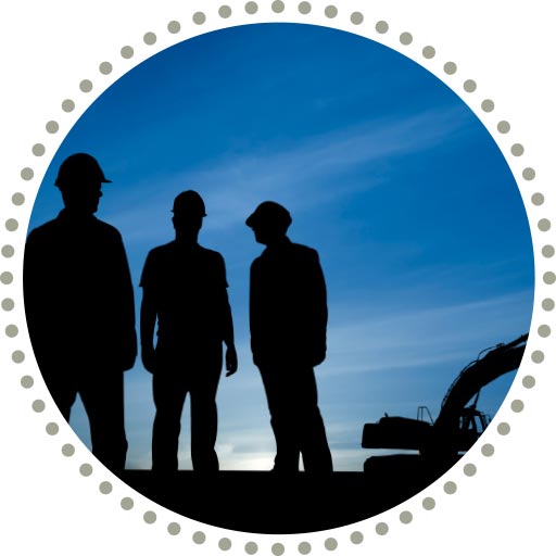 Illustration of three workers and a digger, silhouetted agains a dark blue sky